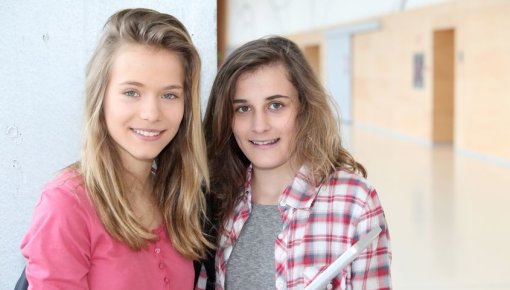 Photo of two teenage girls smiling