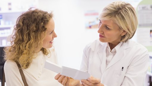 Photo of a woman talking with her doctor