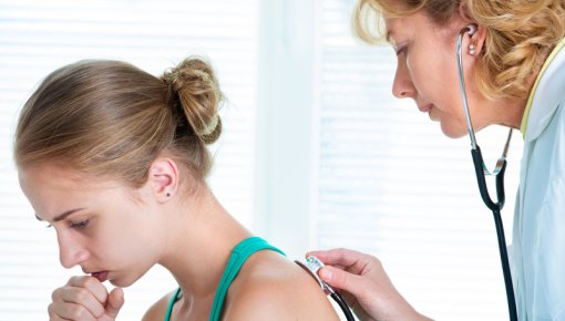 Photo of a patient being examined by a doctor