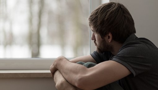 Photo of a man deep in thought