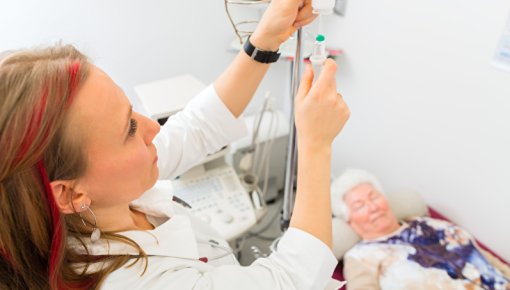 Photo of a doctor preparing an infusion