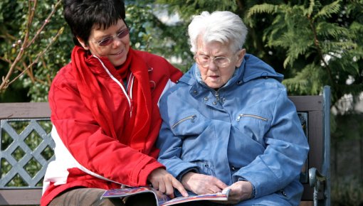 Photo of a mother and daughter outdoors