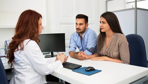 Photo of parents talking to a doctor