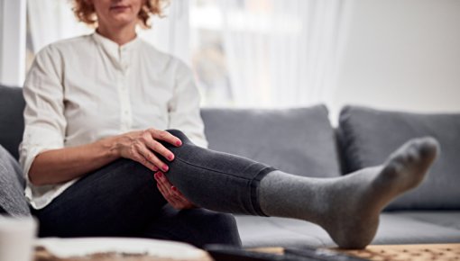 Photo of a woman with her leg raised