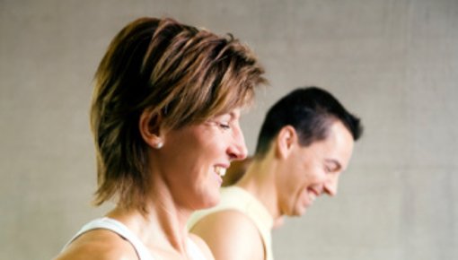 Photo of two people exercising