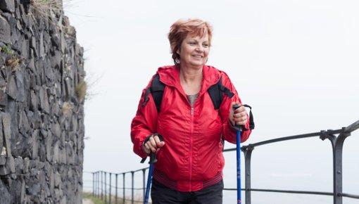Photo of a woman doing Nordic walking