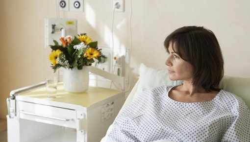 Photo of a woman in a hospital bed