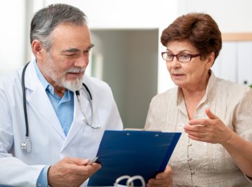 Photo of patient and doctor talking