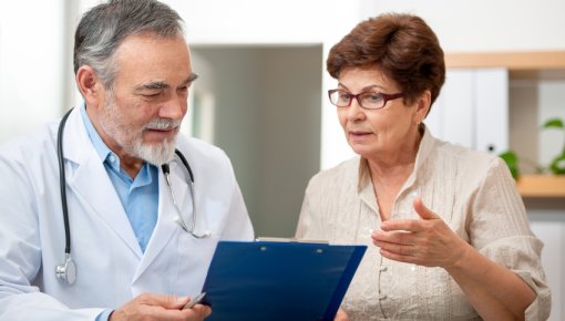 Photo of patient and doctor talking