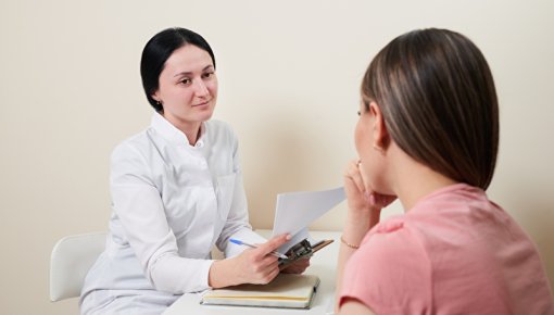 Photo of a doctor talking to a patient