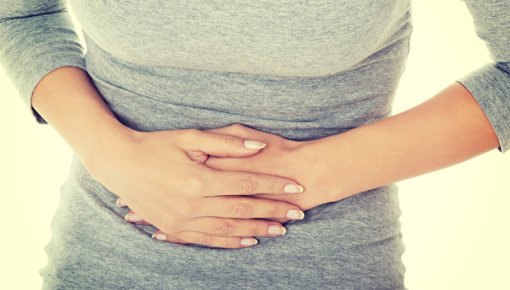 Photo of a woman with abdominal pain