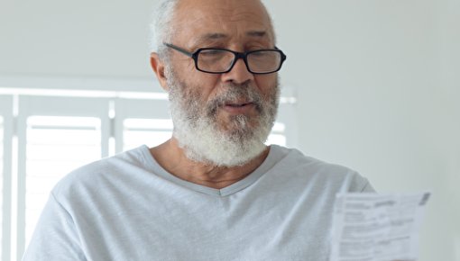 Photo of a man taking medication