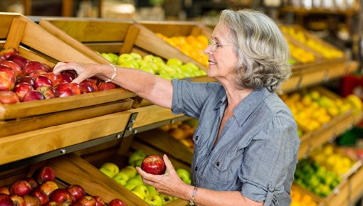 Photo of woman in fruit department