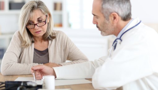 Photo of a doctor talking to a patient