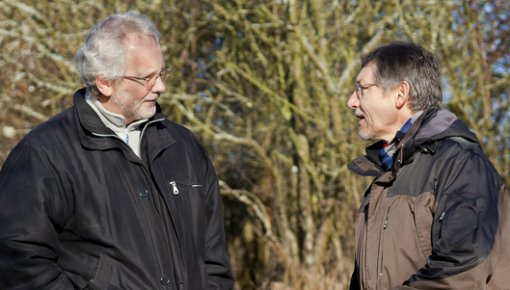 Photo of two men chatting