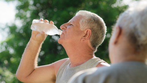 Photo of two men outside after doing exercise