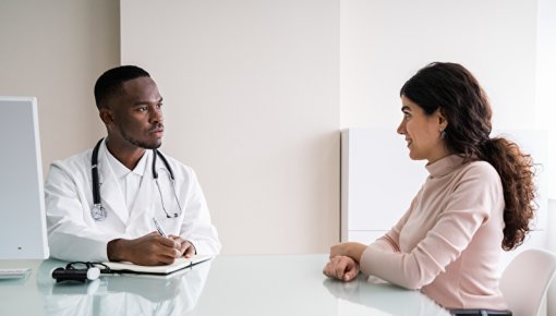 Photo of a doctor talking to a patient