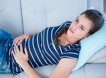 Photo of a woman with abdominal pain