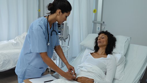 Photo of female nurse and patient after surgery
