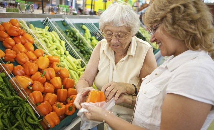 Photo of two women shopping for groceries