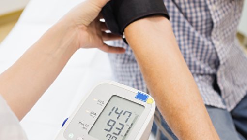 Photo of someone having their blood pressure measured