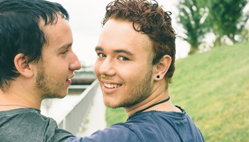 Photo of two men embracing