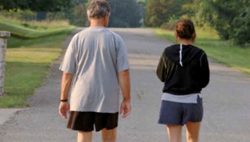 Photo of man and woman jogging