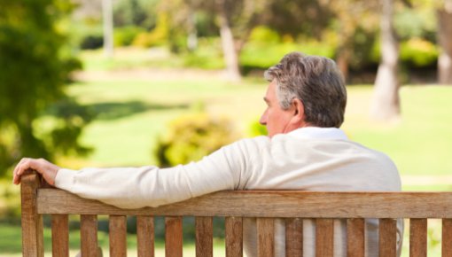 Photo of a man on a bench