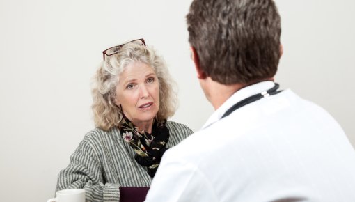 Photo of a woman talking with the doctor