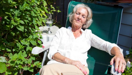 Photo of a woman resting in the garden