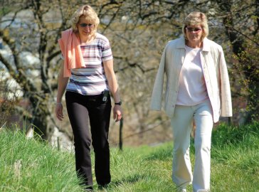 Photo of two women on a walk