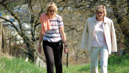 Photo of two women taking a walk