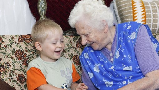 Photo of a grandmother with her grandchild