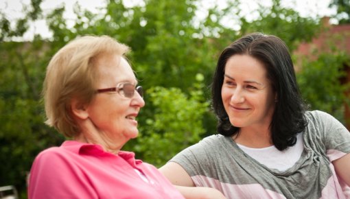 Photo of mother and daughter talking