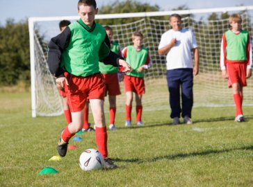 Photo of boys playing football