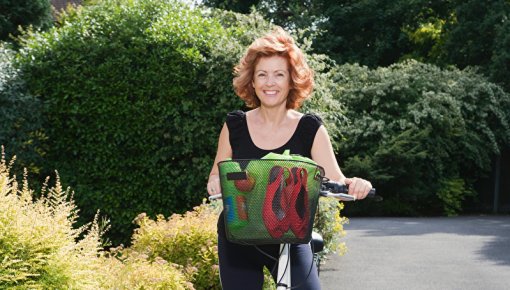 Photo of a woman with a bicycle