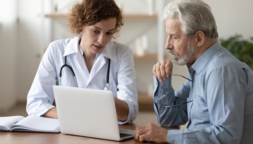 Photo of patient and doctor talking