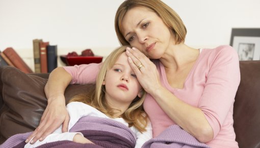 Photo of mother comforting daughter