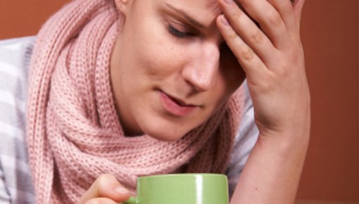 Photo of a woman with a sore throat