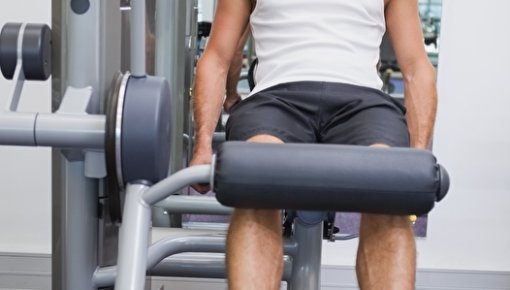 Photo of a man exercising his knee muscles