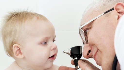 Photo of a doctor and young patient