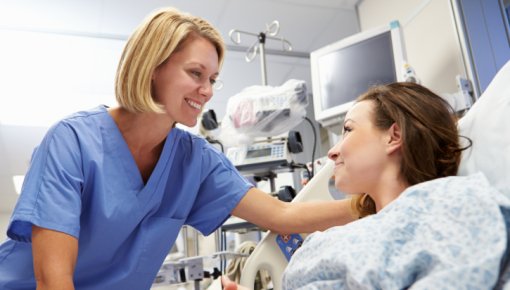 Photo of patient and nurse after surgery