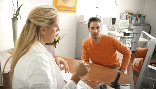Photo of patient and doctor talking