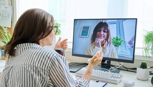 Photo of a woman on a video call