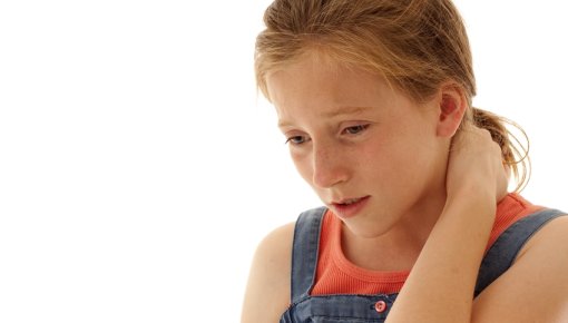 Photo of a girl with an itchy neck