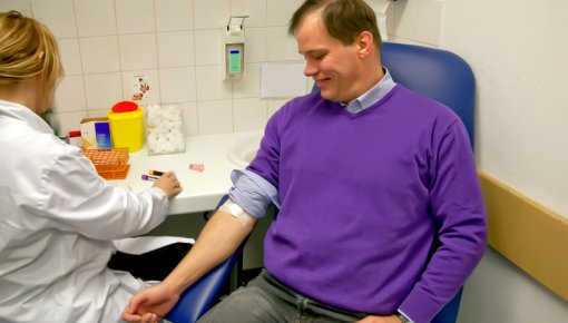 Photo of a patient having a blood sample taken