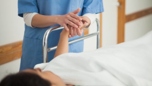 Photo of patient and nurse after surgery