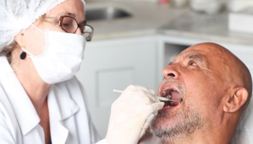 Photo of a dentist and patient