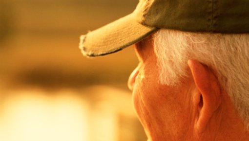 Photo of an older man at sunset