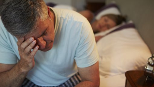 Photo of a man with sleeping problems